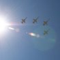 Four T-38 jets about to do a "Missing Man" formation over the JSC memorial Tuesday. NASA photo.