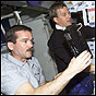 NASA image of STS-100 Mission Specialists Chris Hadfield (left) and Scott Parazynski