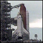 Space Shuttle Discovery waits on the launchpad Thursday. NASA image.
