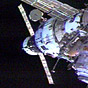 The Progress 6 cargo ship (left) attached to the International Space Station. NASA image.