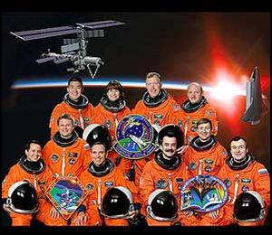 Top Row: Daniel Tani, Linda Godwin, Dom Gorie and Mark E. Kelly. Bottom Row: Daniel Bursch, Yuri Onufrienko, Carl Walz, Mikhail Tyurin, Frank Culbertson, and Vladimir N. Dezhurov. Photo courtesy of NASA.