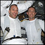 STS-109 Mission Specialists Mike Massimino (left), and Jim Newman. NASA photo.