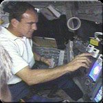 STS-110 Commander Mike Bloomfield is at the controls of Space Shuttle Atlantis on Wednesday during an engine burn to refine the orbiter's approach to the Interntional Space Station. NASA image.