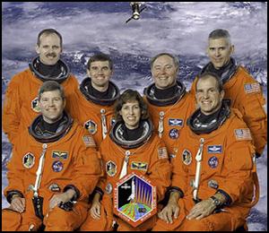 Official NASA portrait of the STS-110 crew.