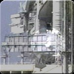 Gaseous hydrogen leaks from a vent line on the Mobile Launch Platform. The leak area is highlighted in this NASA image.