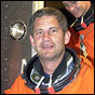 NASA photo of STS-111 Pilot Paul Lockhart leaving the Astrovan after last week's scrub. He doesn't look too happy, does he?