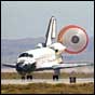 Space Shuttle Endeavour deploys her drag chute in this NASA image.