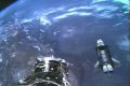 NASA TV capture of Atlantis approaching the International Space Station's docking ring.