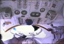 Another helmetcam view of the inside of Alpha's Quest airlock. You can see the labels on the controls! NASA TV capture.