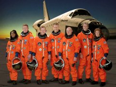 Discovery's crew, L-R: Wilson, Fossum, Lindsey, Sellers, Kelly, Reiter, Nowak. Image courtesy of NASA.