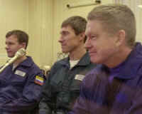 ISS crewmwmbers Gidzenko, Krikalev and Shepherd at a pre-launch press conference at Baikonur complex in Kazakhstan. Photo courtesy of NASA.