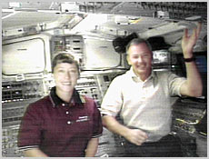 STS-92 Pilot Pamela Melroy and Commander Brian Duffy take questions from Rochester, New York television reporters yesterday. Image couresy of NASA.