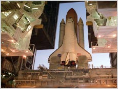 Space Shuttle Atlantis begins rolling out of the Vehicle Assembly Building to Launch Pad 39A on Jan. 26. NASA photo.