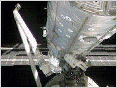 STS-98 Astronaut Bob Curbeam works on the outside of the U.S. Destiny Laboratory Module during the third STS-98 space walk. NASA image.